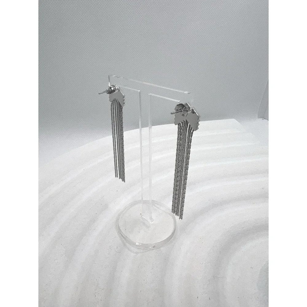 Long‎ earrings with chain fringes and rhinestones.